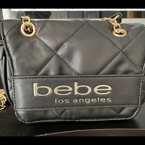 Bebe black handbag with with gold chain strap